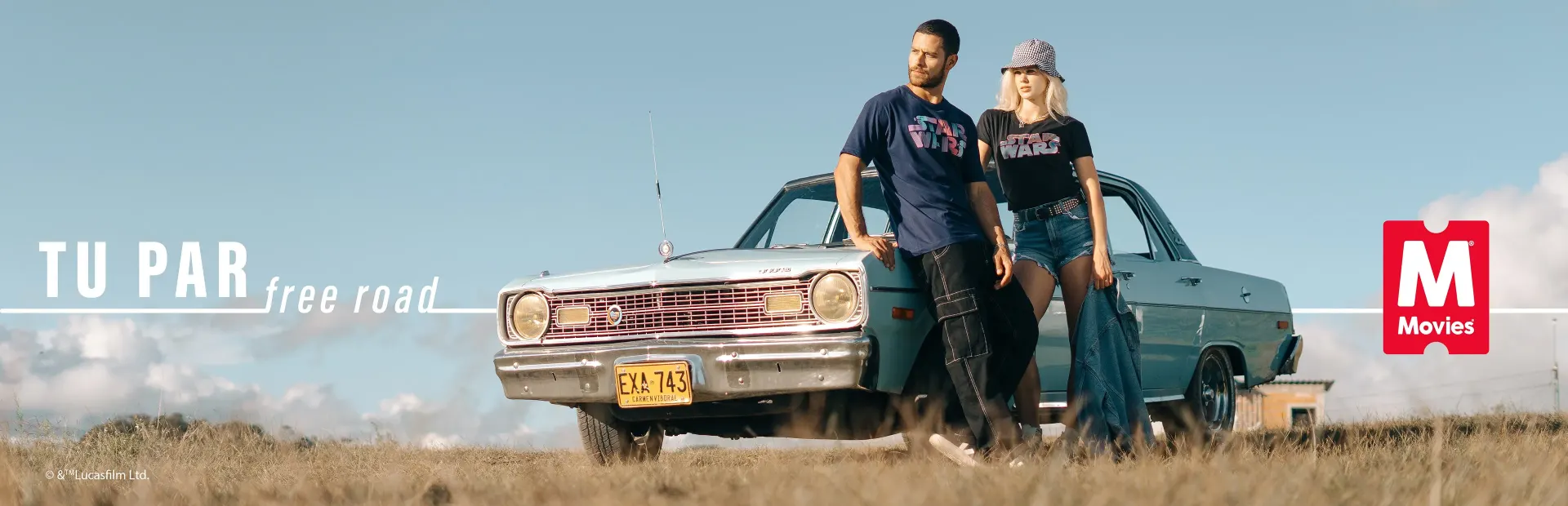 Banner de la campaña TU PAR para Movies Shop: pareja recostada en un auto clásico en un campo, con el lema free road y el logo Movies.